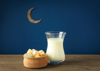 Concept of Ramadan Kareem food on wooden table