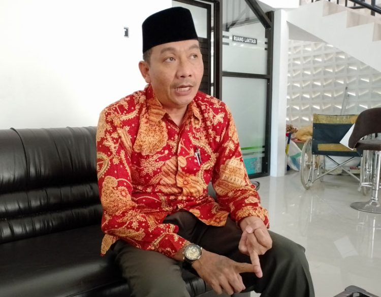 Kasi Haji dan Umroh Kemenag Pati, Abdul Hamid saat dimintai tanggapan soal Haji Metaverse. (Arif Febriyanto/Harianmuria.com)