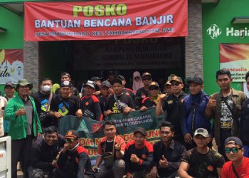 Bansor dan Ansor Kecamatan Tlogowungu saat memberikan bantuan ke Desa Sinomwidodo. (Istimewa/Harianmuria.com)
