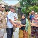 GERAK CEPAT: DPC Gerindra Demak saat memberikan bantuan kepada warga terdampak banjir.(Tomi Budiantoro/Harianmuria.com)