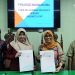 Penandatanganan MoA antara Dekan Fakultas Syariah IAIN Kudus Dr. Any Ismayawati, S.H., M.Hum dengan Pemred Koran Lingkar dan Lingkar TV Nailin RA di Gedung Fakultas Syariah IAIN Kudus, Jumat (24/3). (Nisa/Harianmuria.com)