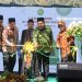 POTONG PITA: Bupati Blora Arief Rohman saat menghadiri perubahan status Sekolah Tinggi Agama Islam (STAI) Al Muhammad, Cepu menjadi Institut Agama Islam pada Minggu, 9 Juli 2023. (Dok. Humas Pemkab Blora/Harianmuria.com)