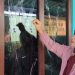 Sukati warga Desa Waturoyo, Kecamatan Margoyoso, Kabupaten Pati menunjukkan kaca di jendela rumahnya disolasi untuk menghindari kerusakan saat ada sound horeg yang melintas. (Setyo Nugroho/Harianmuria.com)