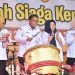 Pj Wali Kota Salatiga Yasip Khasani menabuh genderang saat meluncurkan tiga Sekolah Siaga Kependudukan. (Dok. Setda Salatiga/Harianmuria.com)