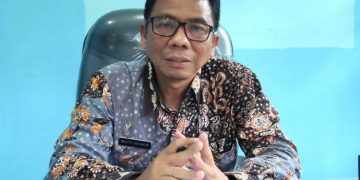 Kepala Dinas Sosial Pemberdayaan Perempuan dan Keluarga Berencana (Dinsos PPKB) Kabupaten Rembang, Prapto Raharjo, memberikan keterangan terkait penyusunan GDPK. (Dok. Dinkominfo Rembang/Harianmuria.com)