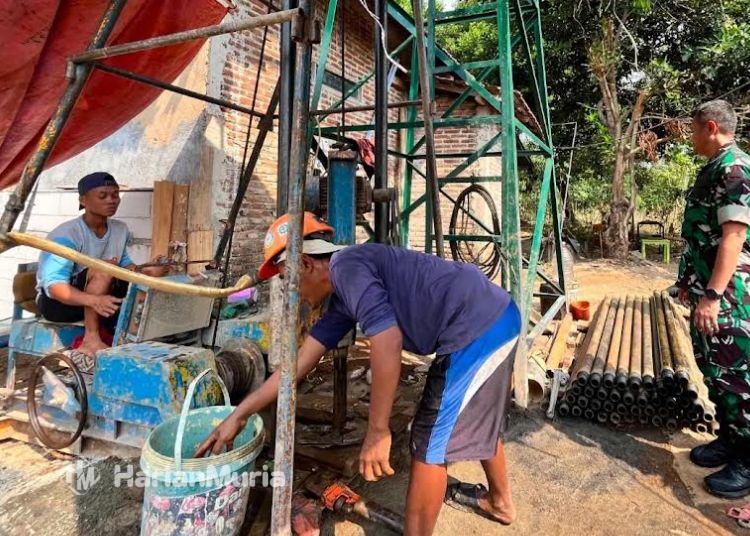 Atasi Krisis Air Bersih, Sumur Bor Dibangun di Dukuh Ngancar Jepara - Harianmuria Tampak pembangunan sumur bor di Dukuh Ngancar, Desa Lebak, Kecamatan Pakisaji, Jepara. (Tomi Budianto/Harianmuria.com)